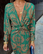 Dineke - Elegant dress with long sleeves and floral print